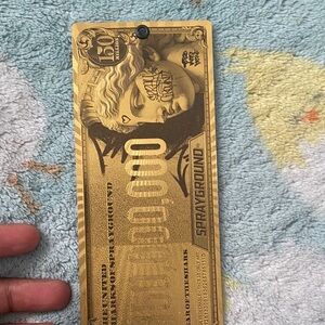 Sprayground Gold Artistic Tag